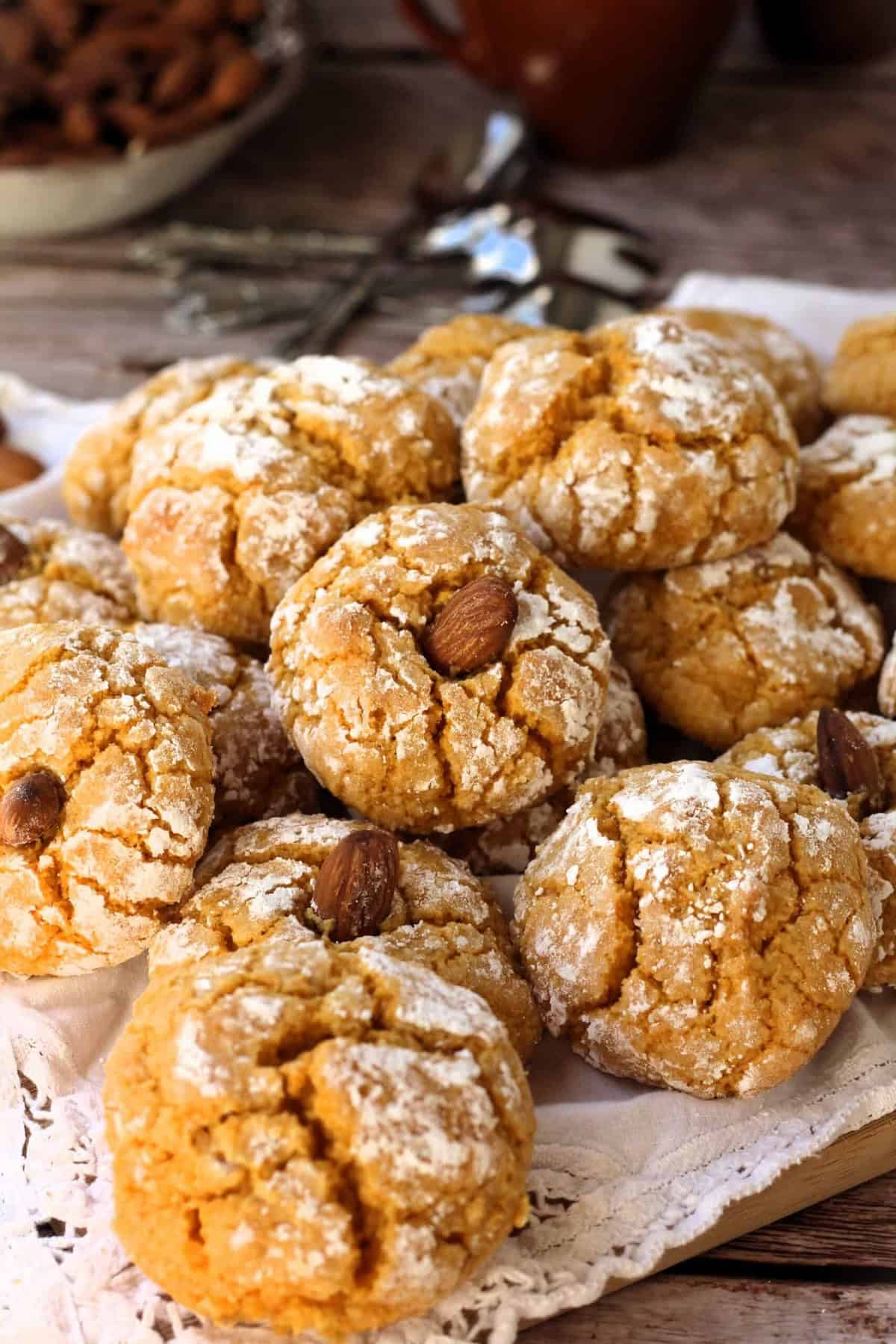 Pumpkin crinkle cookies with almond flour topped with almonds.