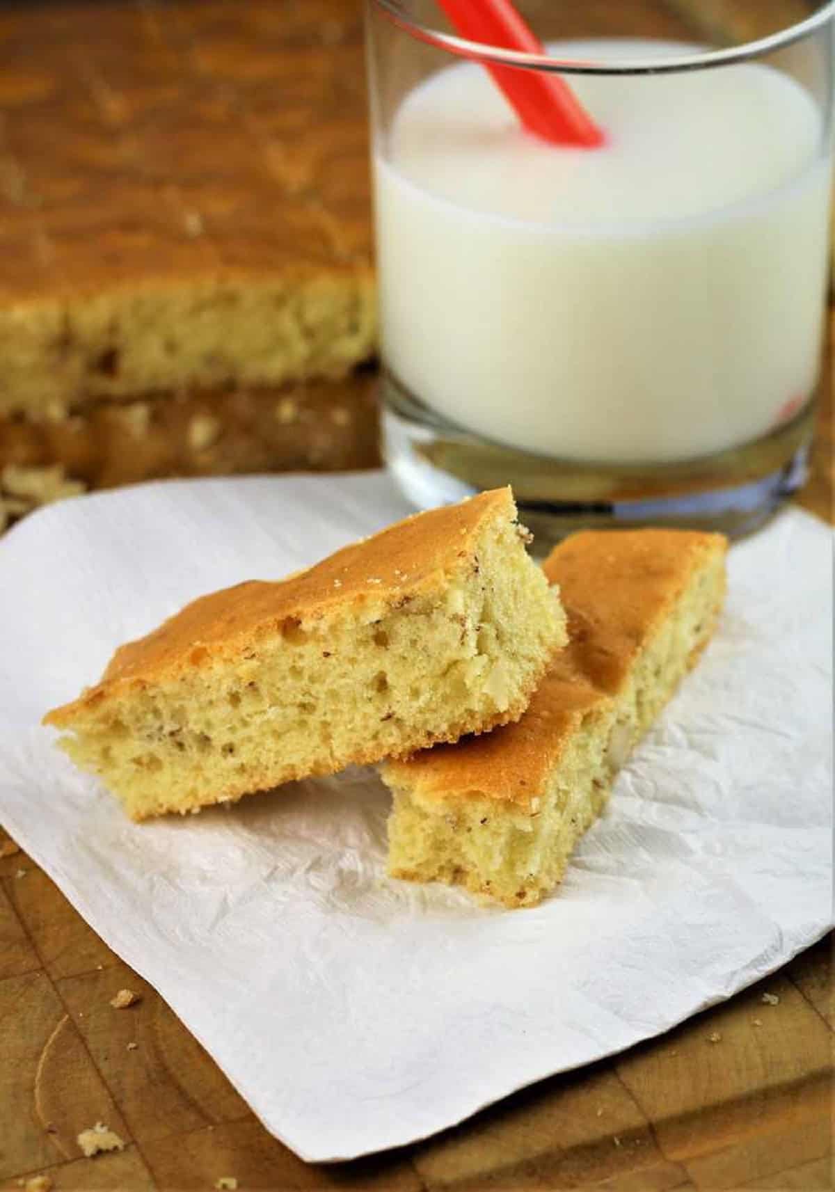 Sheet Pan Almond Biscotti Soft sheet pan almond biscotti next to glass of milk.