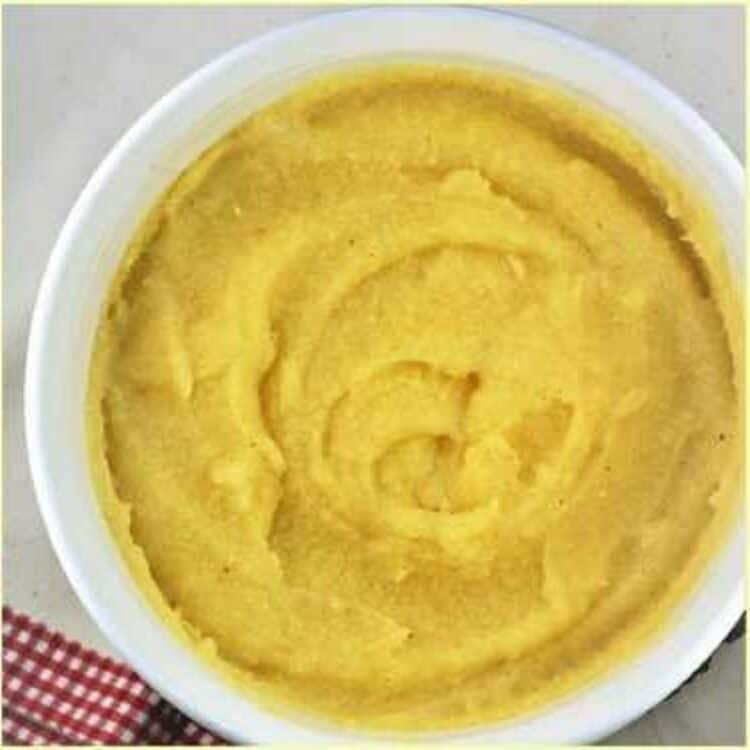 Oven baked polenta in casserole dish.