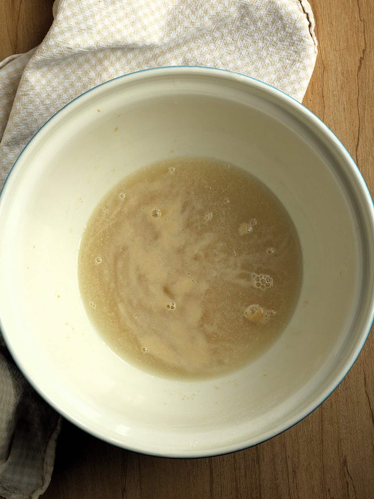 Proofed active dry yeast in large mixing bowl for Mafalda bread.