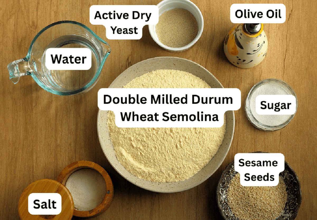 Semolina flour, sugar, yeast,  sesame seeds, salt, water and olive oil.