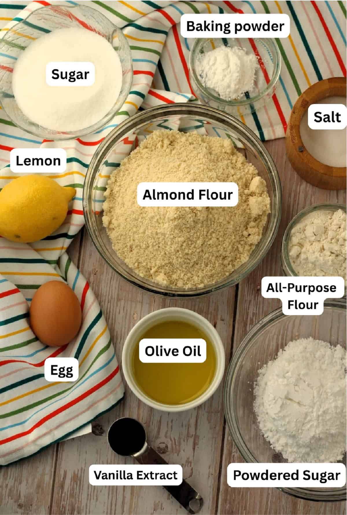 Almond flour, lemon, egg, oil, flour, baking powder, vanilla extract, salt, sugar.