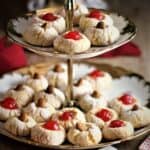 Chewy amaretti cookies on tiered cookie plate.