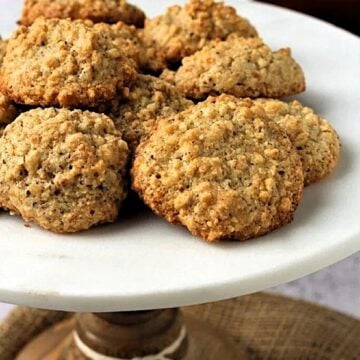 3-ingredient hazelnut cookies piled on cookie stand.
