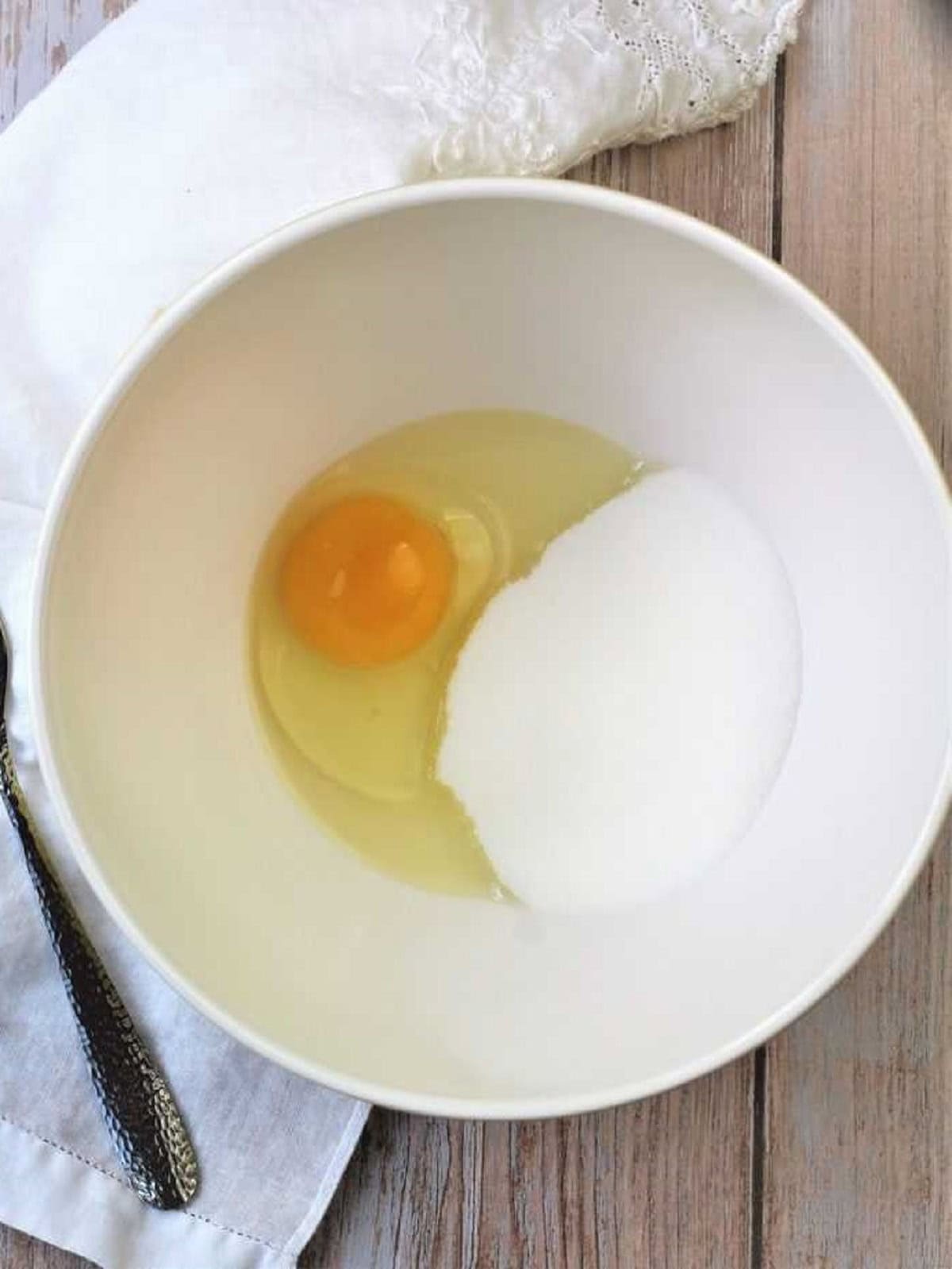 Egg and sugar in large mixing bowl.