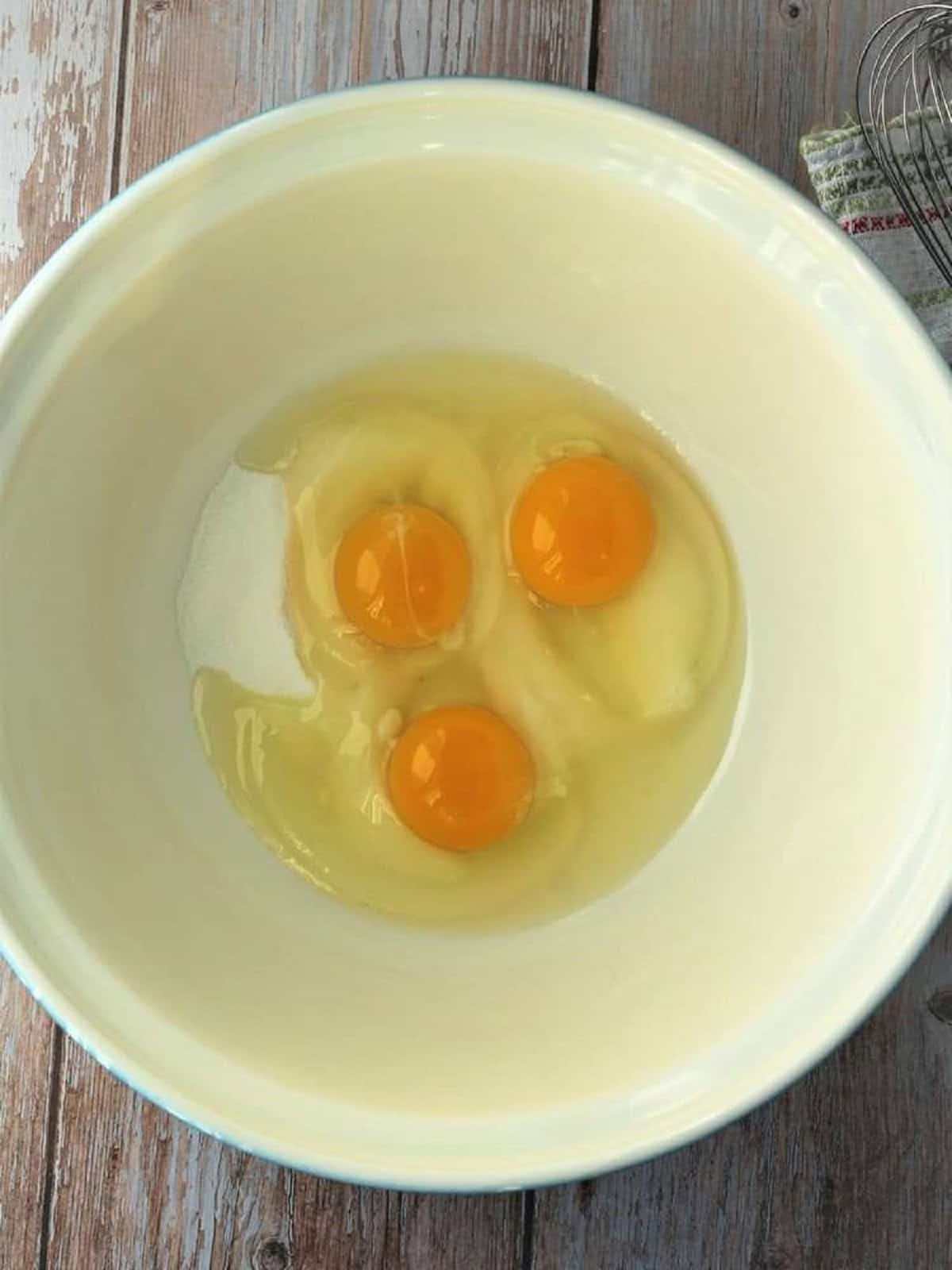 Eggs and sugar in large mixing bowl.