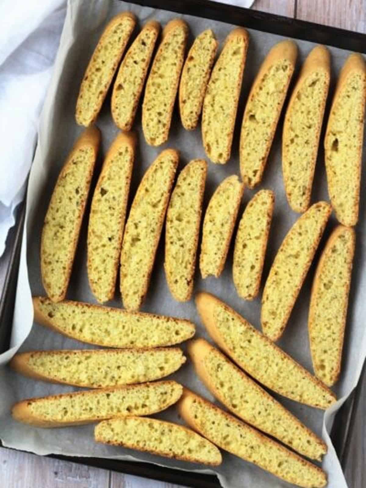 Anise biscotti on baking sheet.