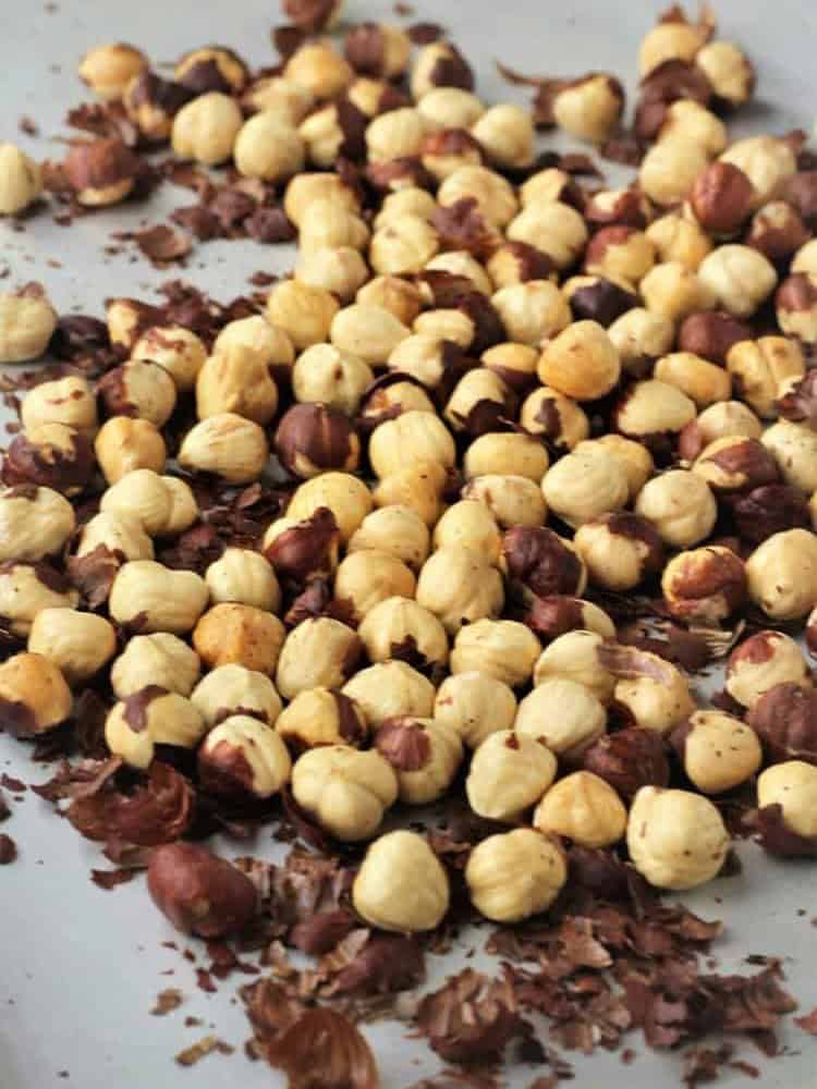 Whole roasted hazelnuts with skin removed.