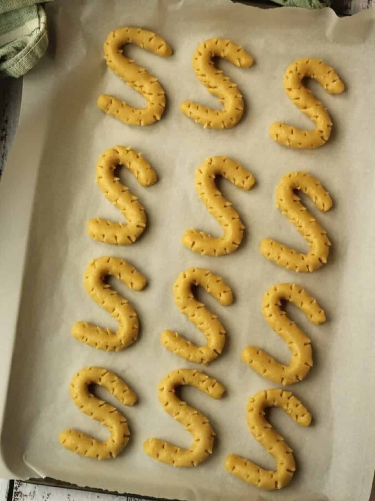 S cookie dough on baking sheet ready for the oven.