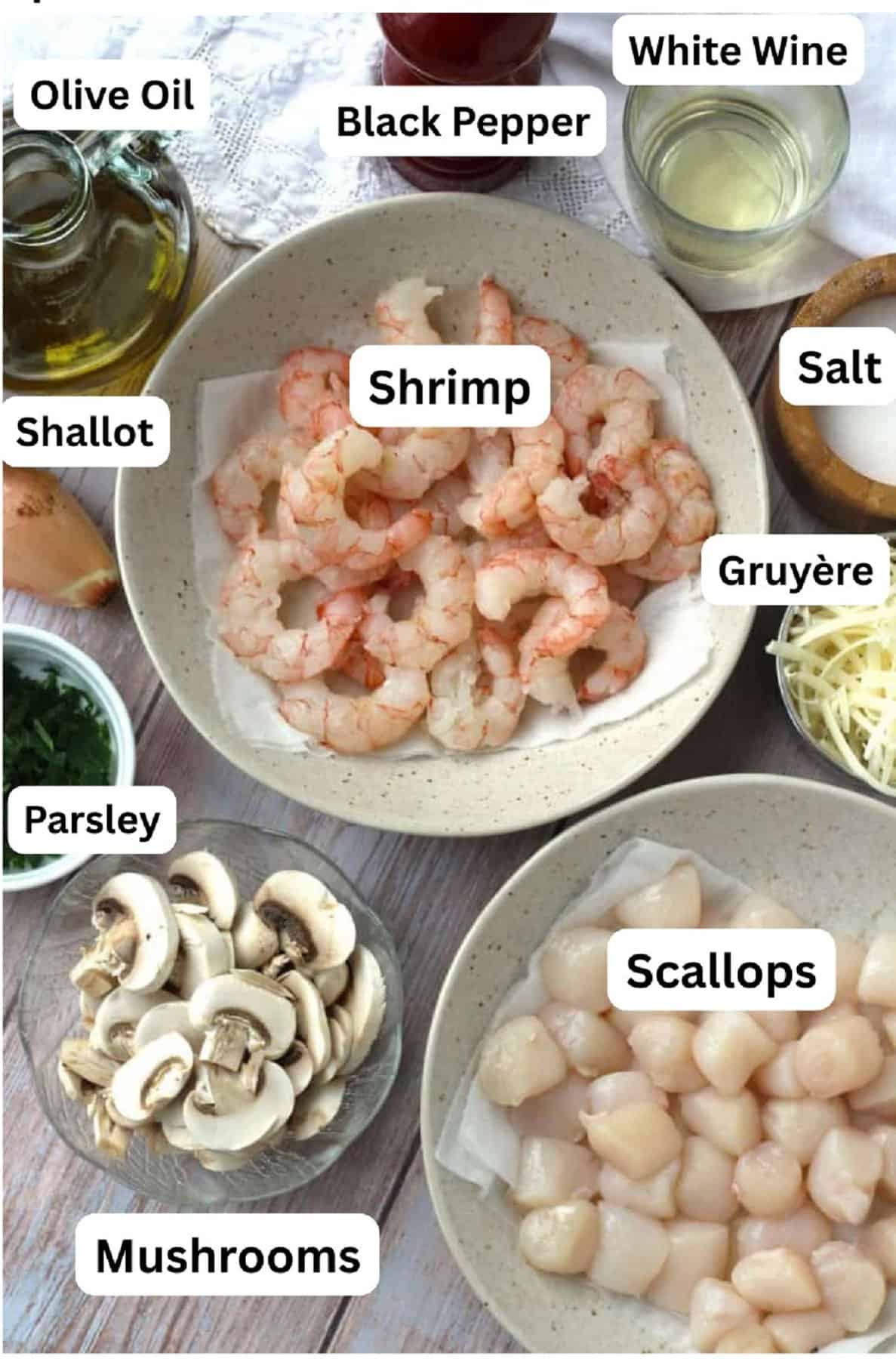 Shrimp, scallops, mushrooms, parsley, shallot, oil, black pepper, white wine, salt and Gruyère.