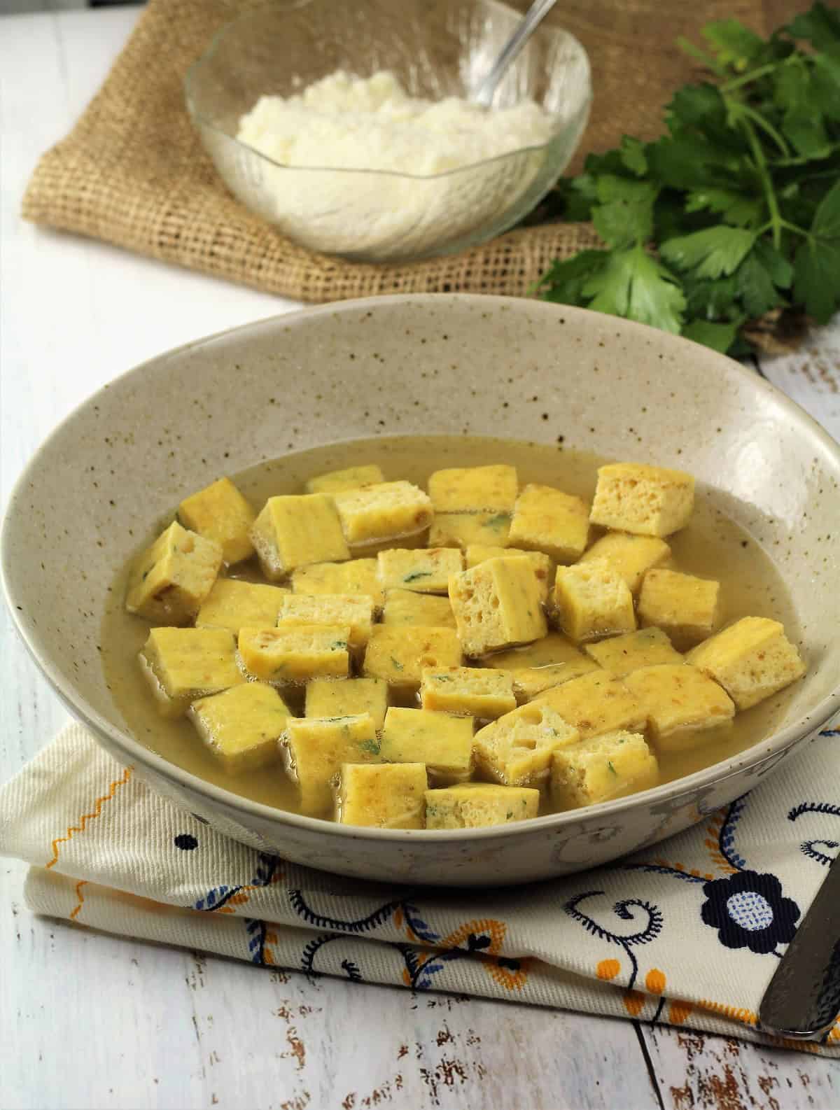 Zuppa imperiale with frittata cubes in chicken broth.