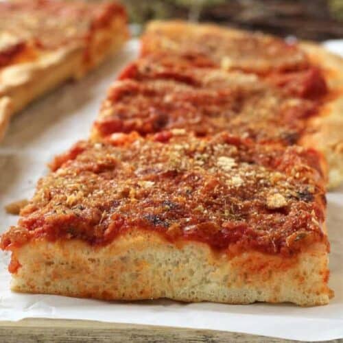 Sicilian sfincione pizza cut into squares.