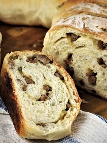 Sausage bread cut into wedges.