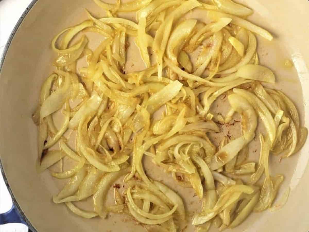 Sliced onions sautéed in olive oil for bignolati filling.