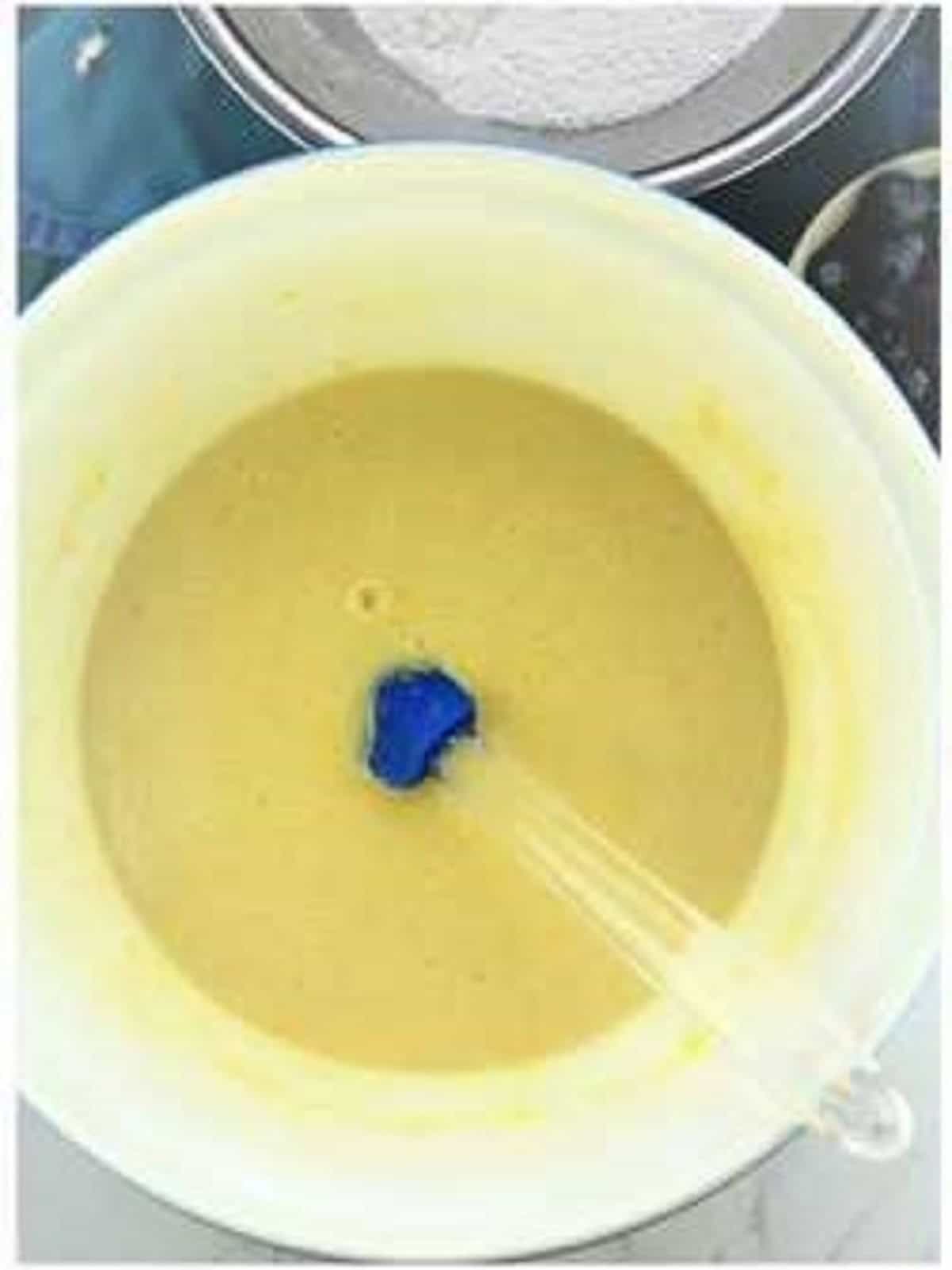 Olive oil cake batter in large bowl.