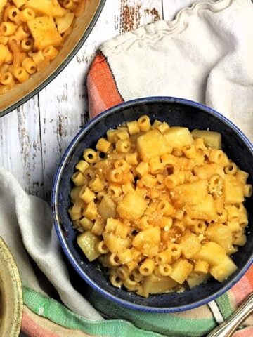 Bowl of pasta and potatoes soup.