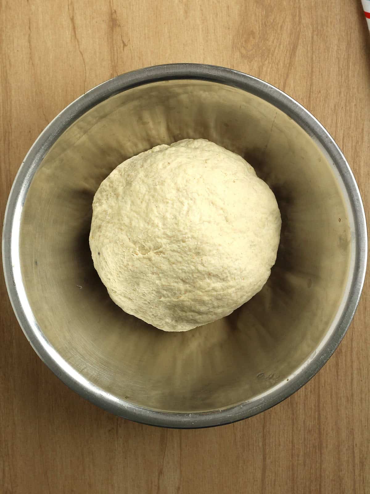 Lingue di pizza dough in bowl.