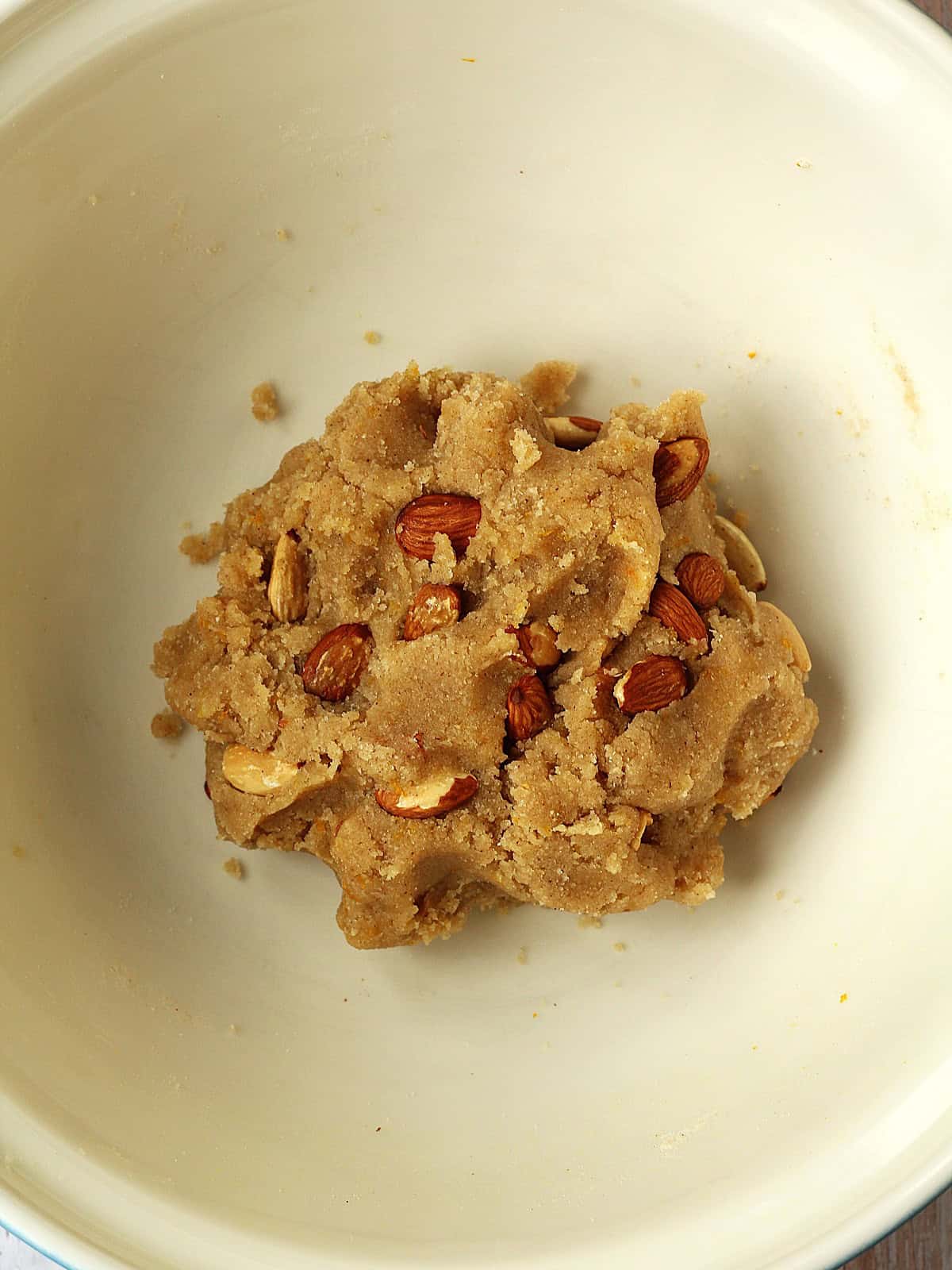 Almond kneaded into quaresimali cookie dough.