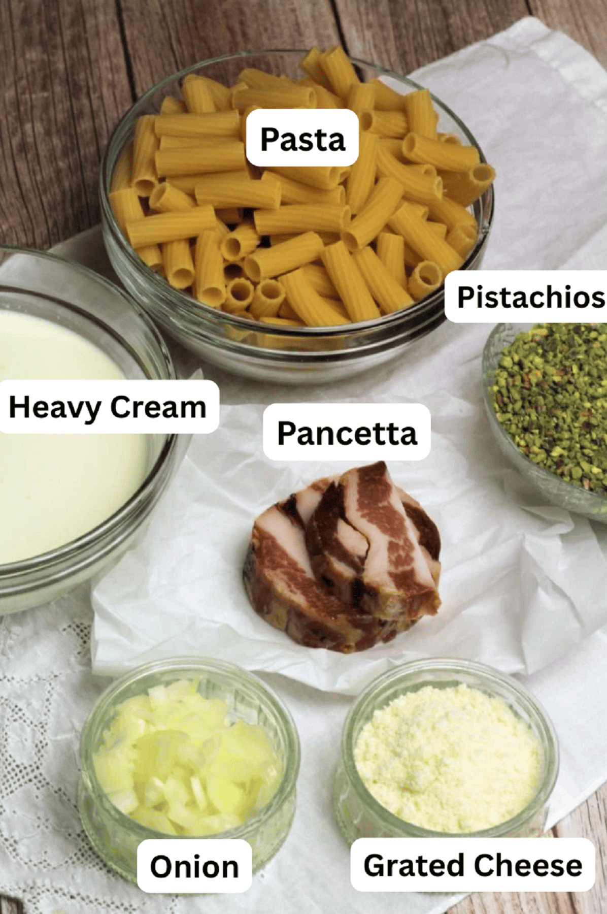 Pasta, pistachios, panccetta, heavy cream, onion and grated cheese.