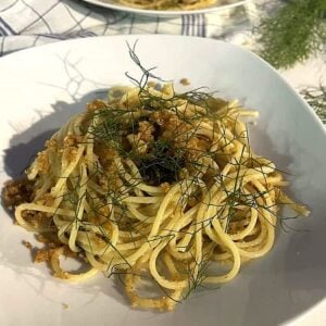 Sicilian pasta with wild fennel and breadcrumbs on plate.