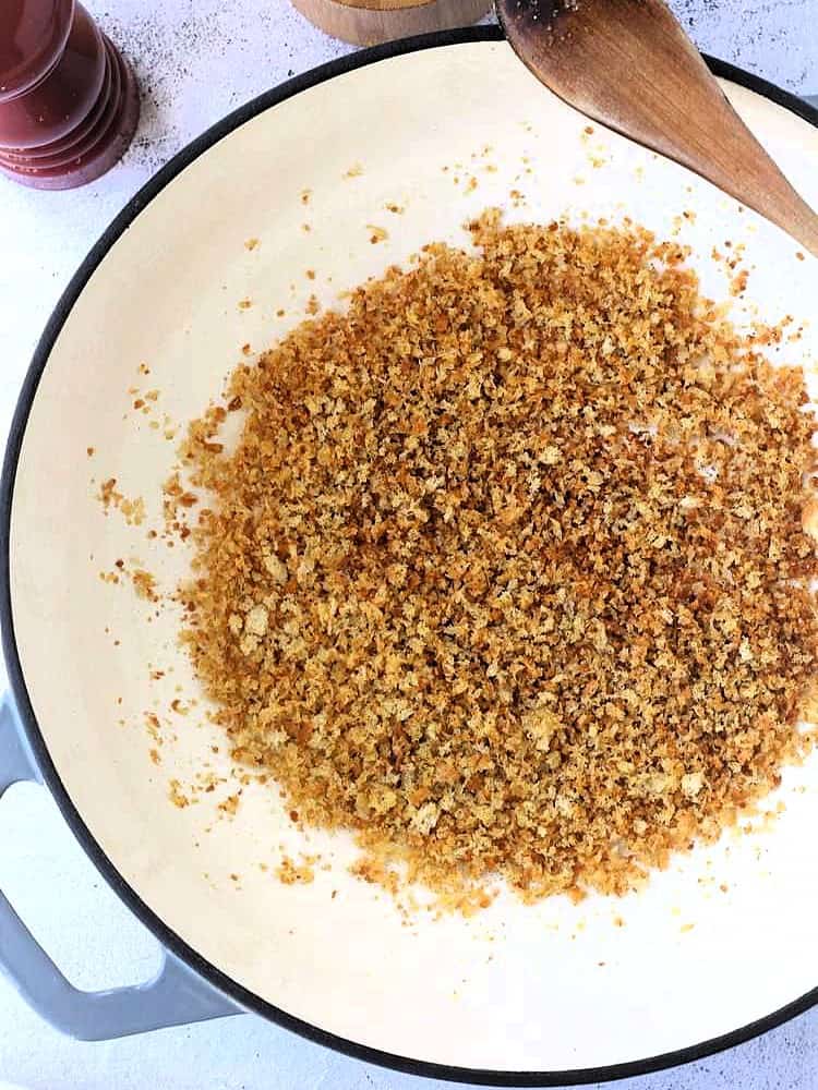 Toasted breadcrumbs sautéed in olive oil for anchovy pasta recipe.