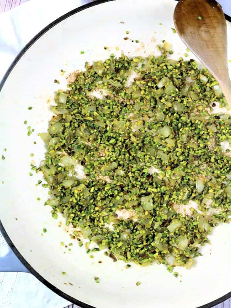 Pistachios toasted in skillet for pistachio pasta recipe.