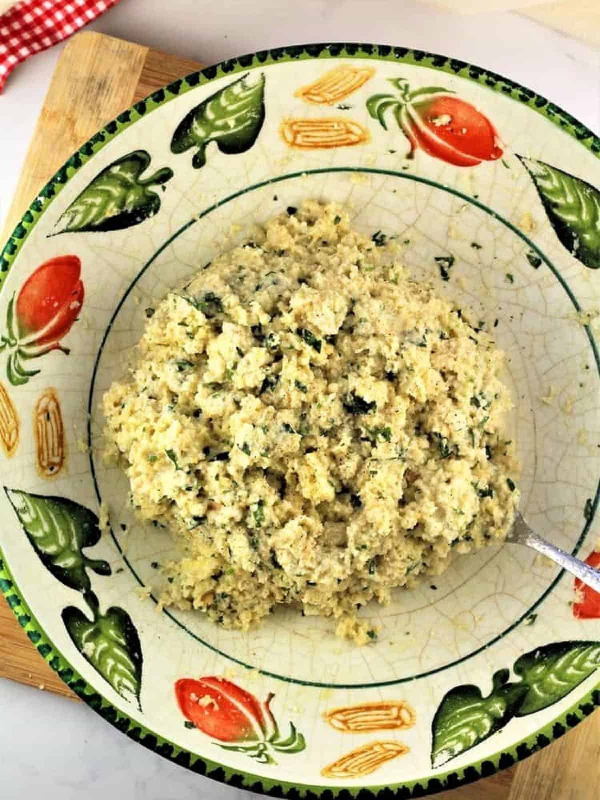 Meatless meatballs mixture in mixing bowl.