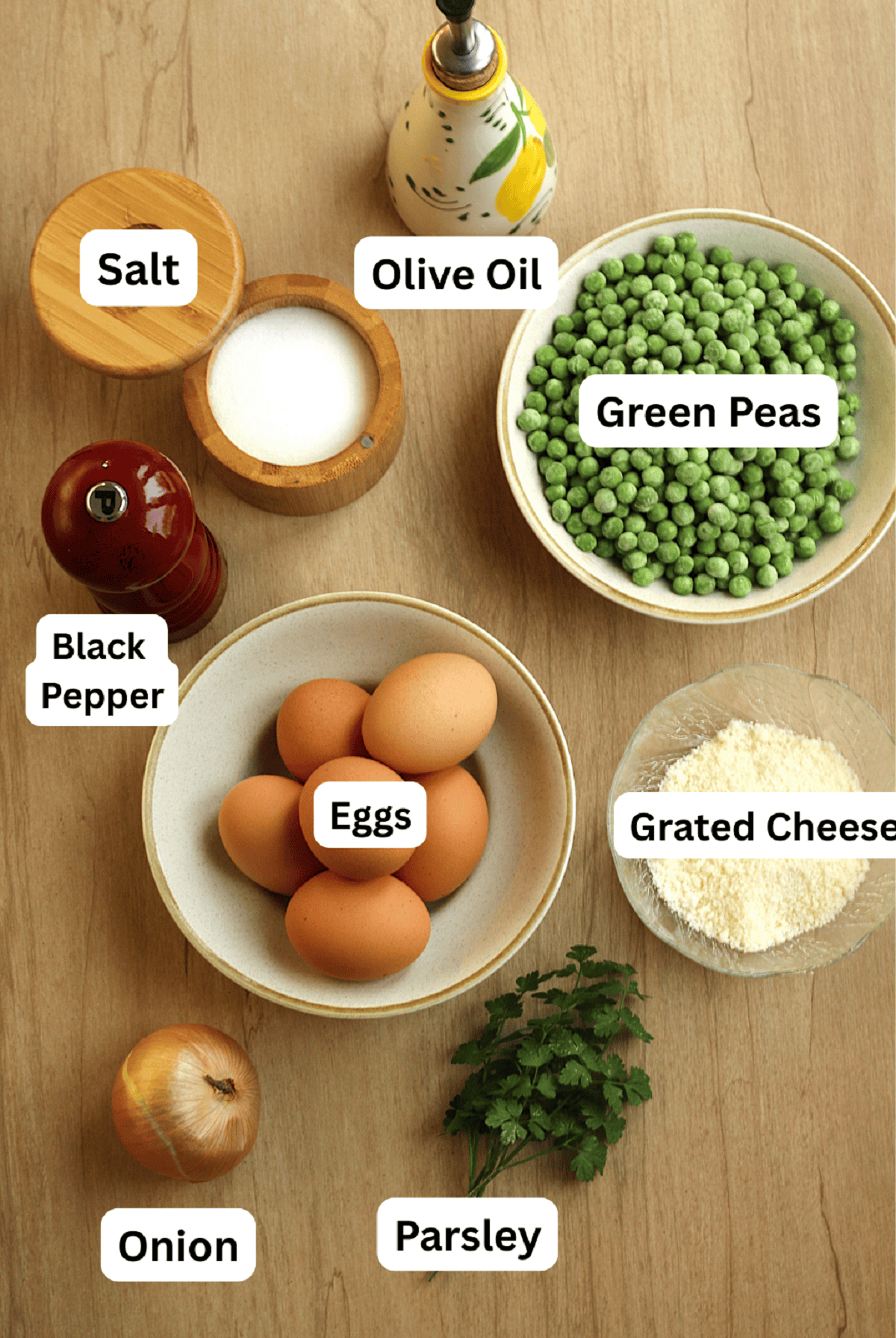 Green peas, eggs, grated cheese, parsley, onion, pepper, salt and oil.