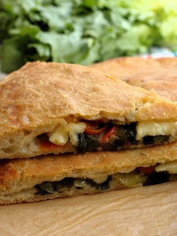 Schiacciata Messinese double crust pizza filled with escarole.