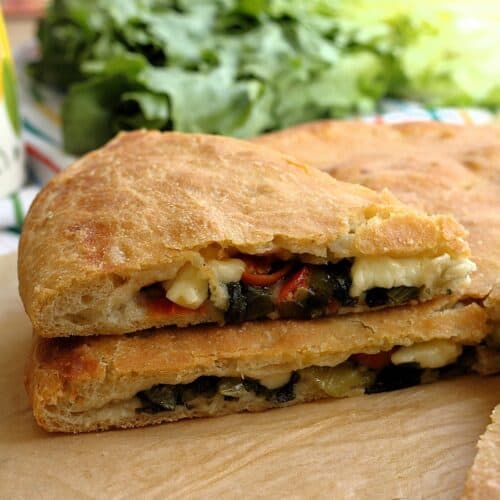 Schiacciata Messinese double crust pizza filled with escarole.