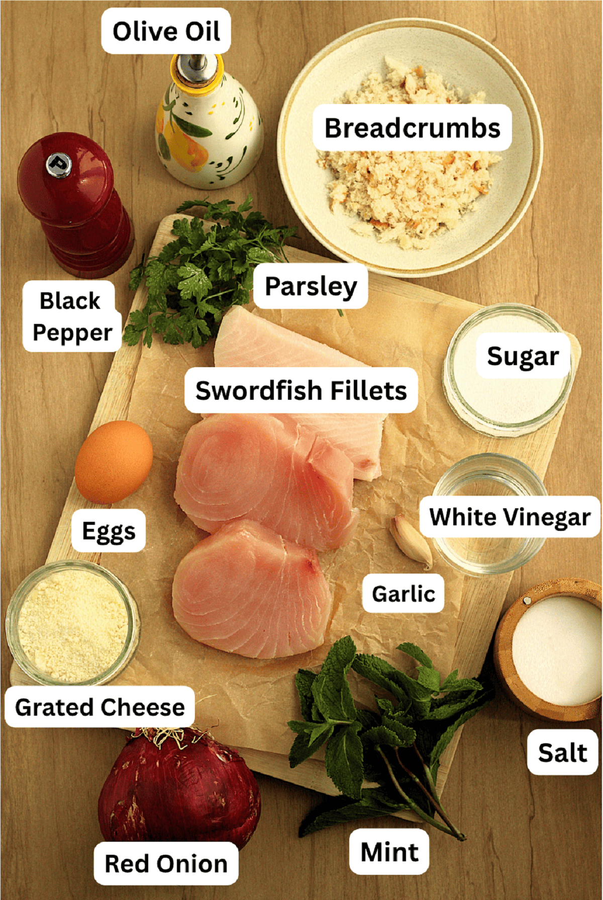 Swordfish, breadcrumbs, eggs, cheese, parsley, mint, egg, onion, oil, salt and pepper.