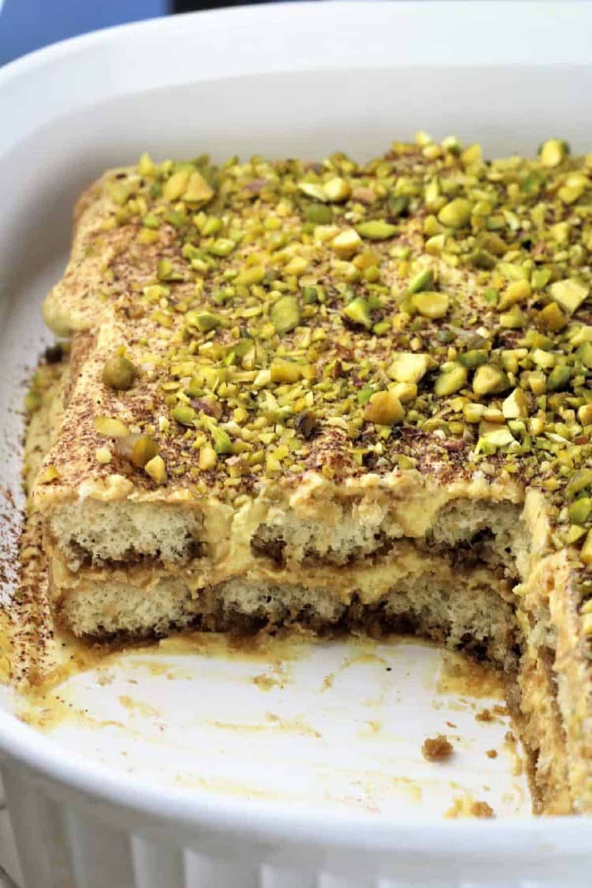 Pistachio Tiramisu Pistachio tiramisu in white casserole dish.