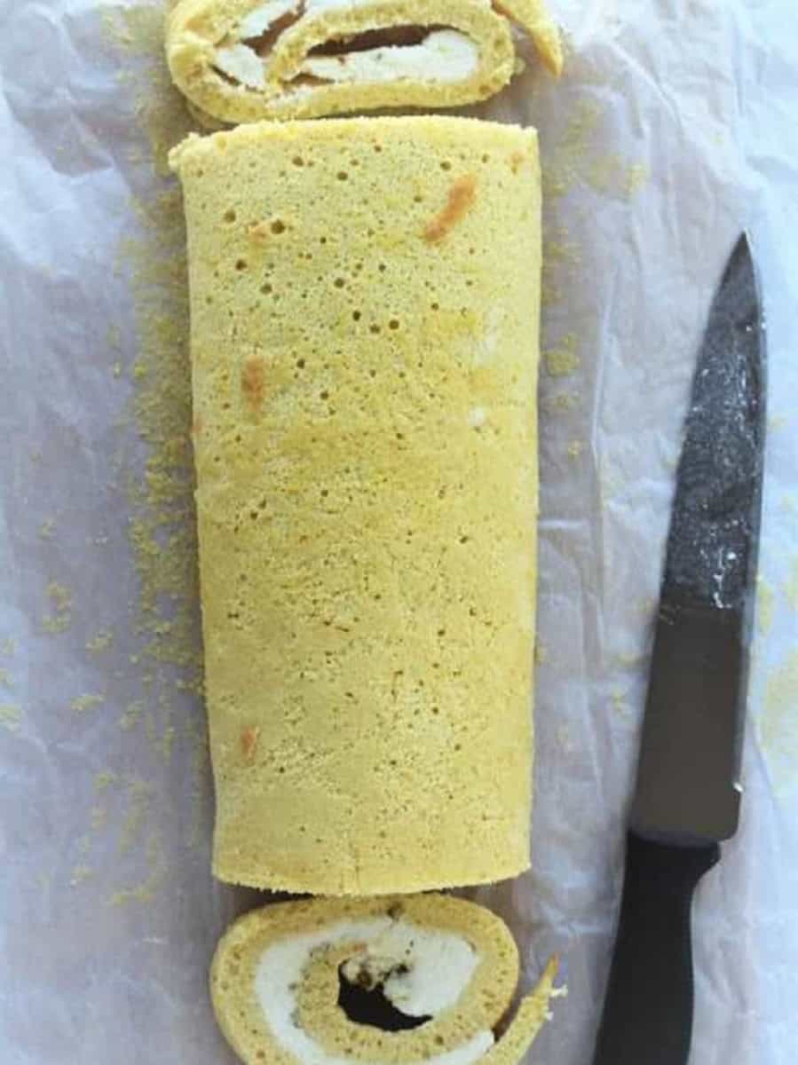 Ricotta cake roll with ends cut off.