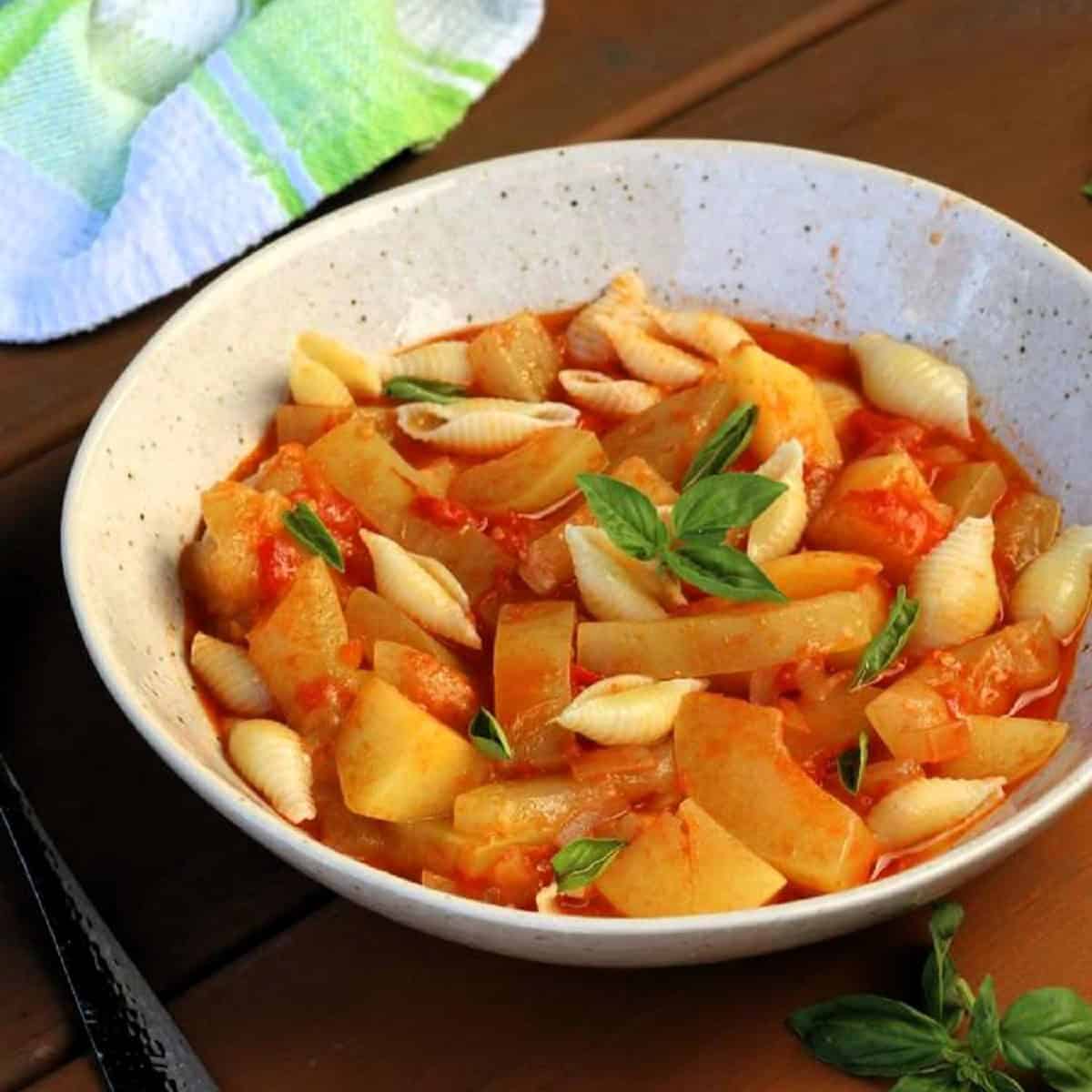 Sicilian past with cucuzza in bowl.