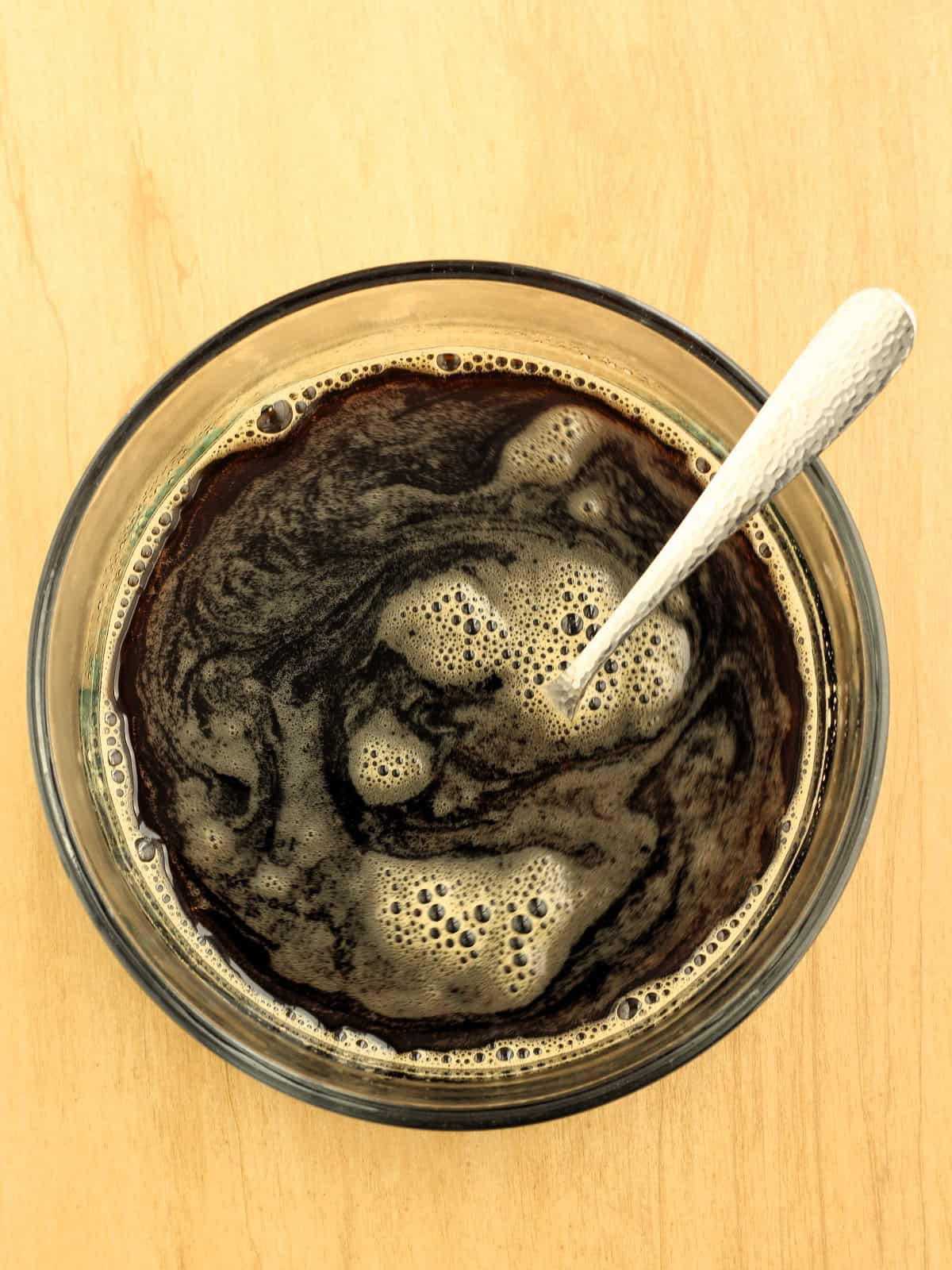 Espresso coffee with simply syrup stirred in.