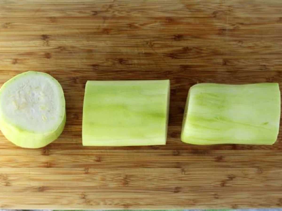 Cucuzza squash cut into 3 pieces.