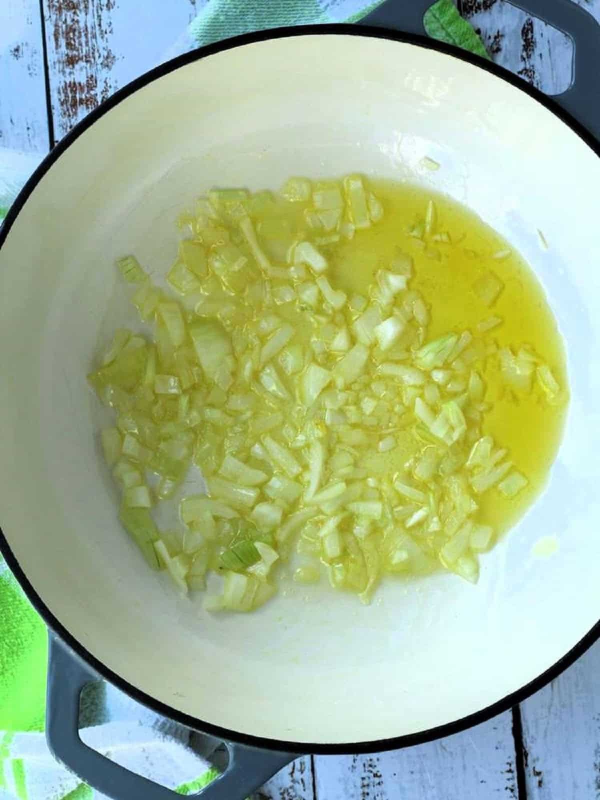Diced onion sautéed in olive oil in large skillet.