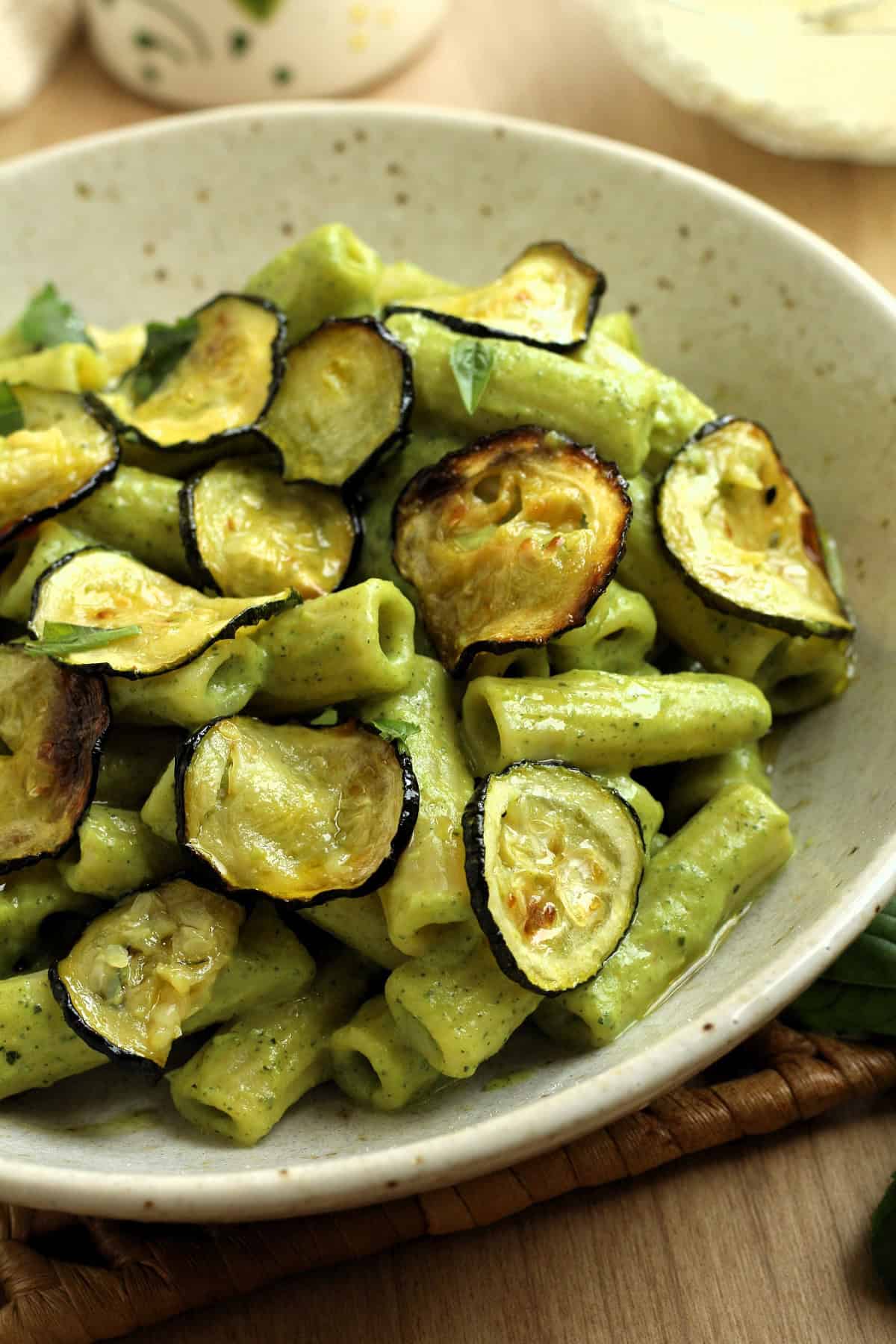 Zucchini pasta with pesto and oven roasted zucchini slices.