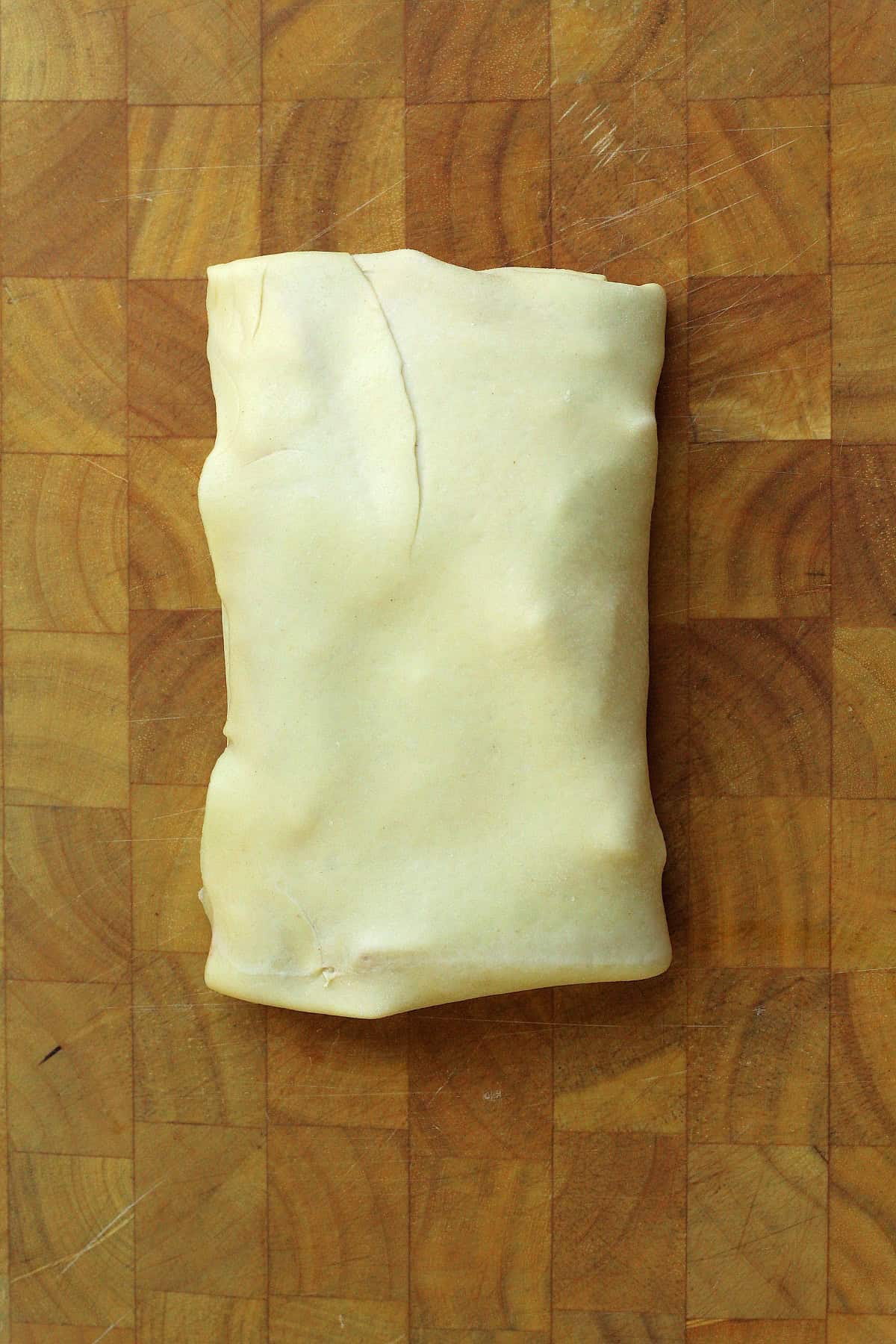 Shaped scaccia dough filled with tomato sauce, cheese and basil.