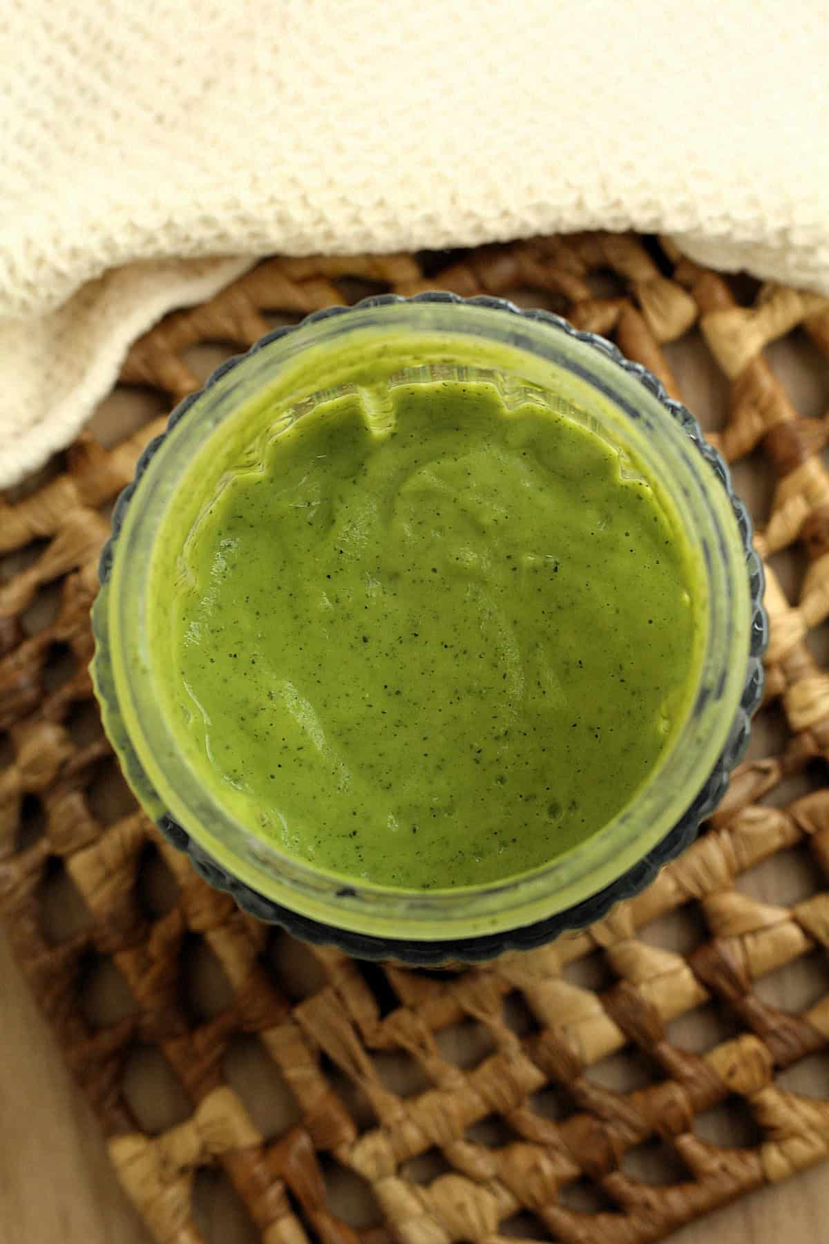 Creamy zucchini pesto processed in blender.