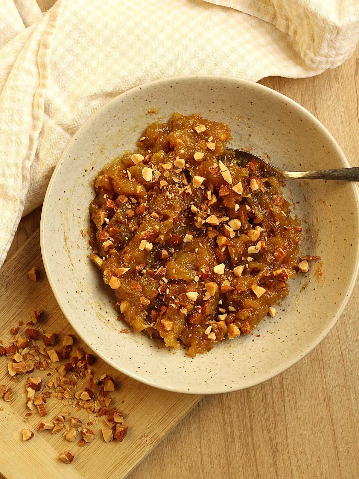 Fig jam in bowl with chopped almonds stirred in.