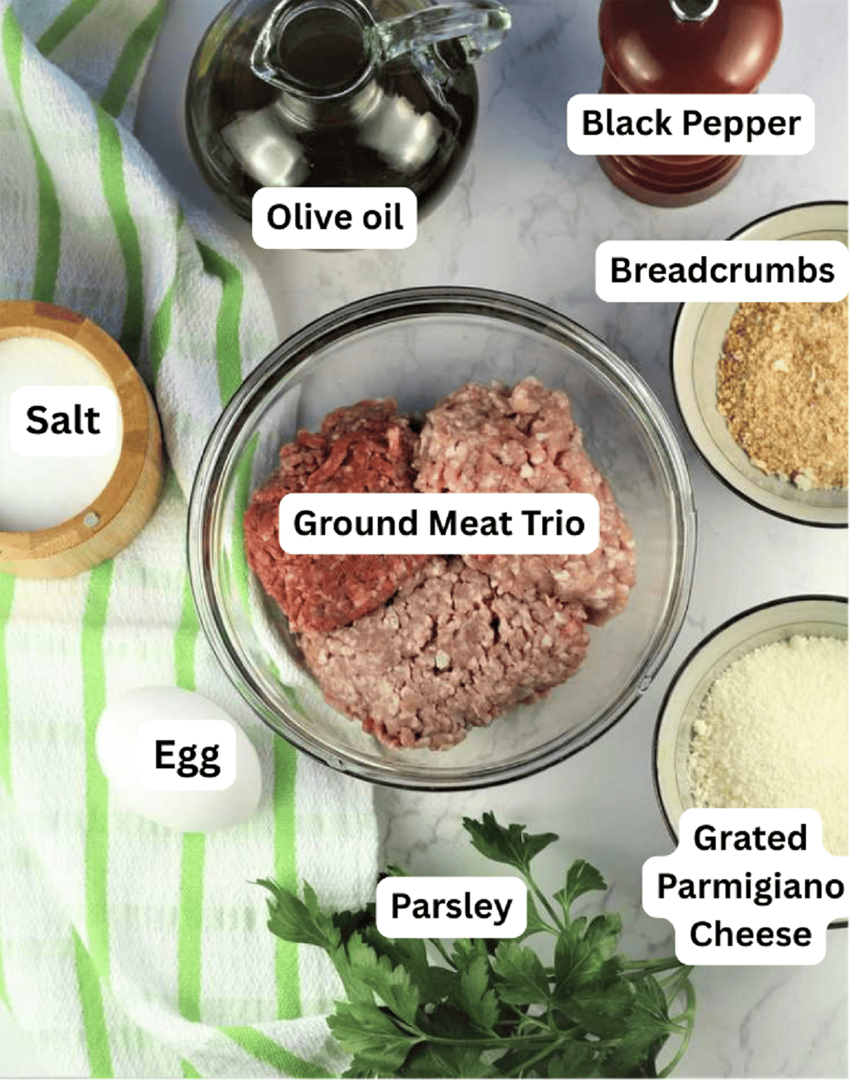 Ground meat trio, breadcrumbs, cheese, egg, salt, oil, pepper, breadcrumbs and parsley.