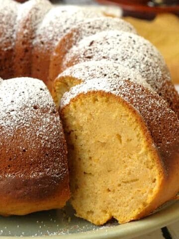 Italian squash cake sliced on plate.